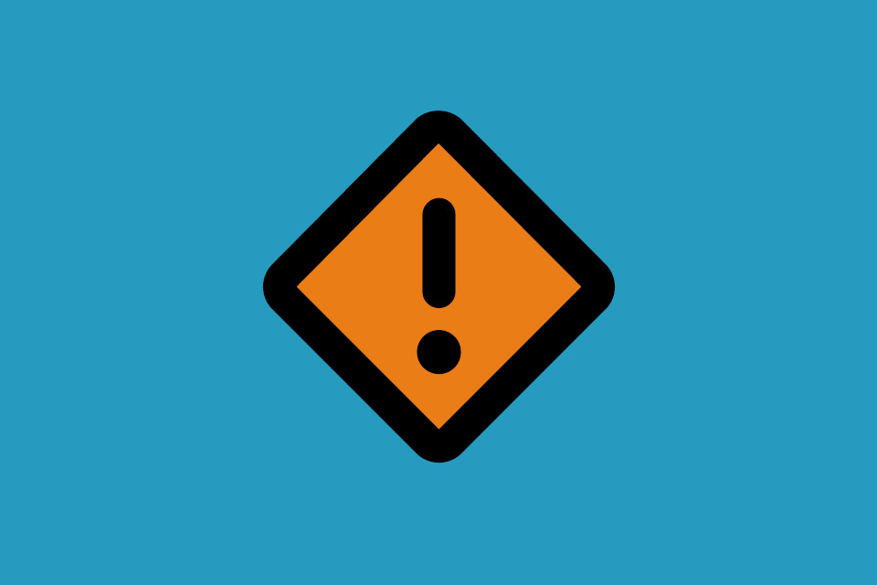 Orange varningssymbol